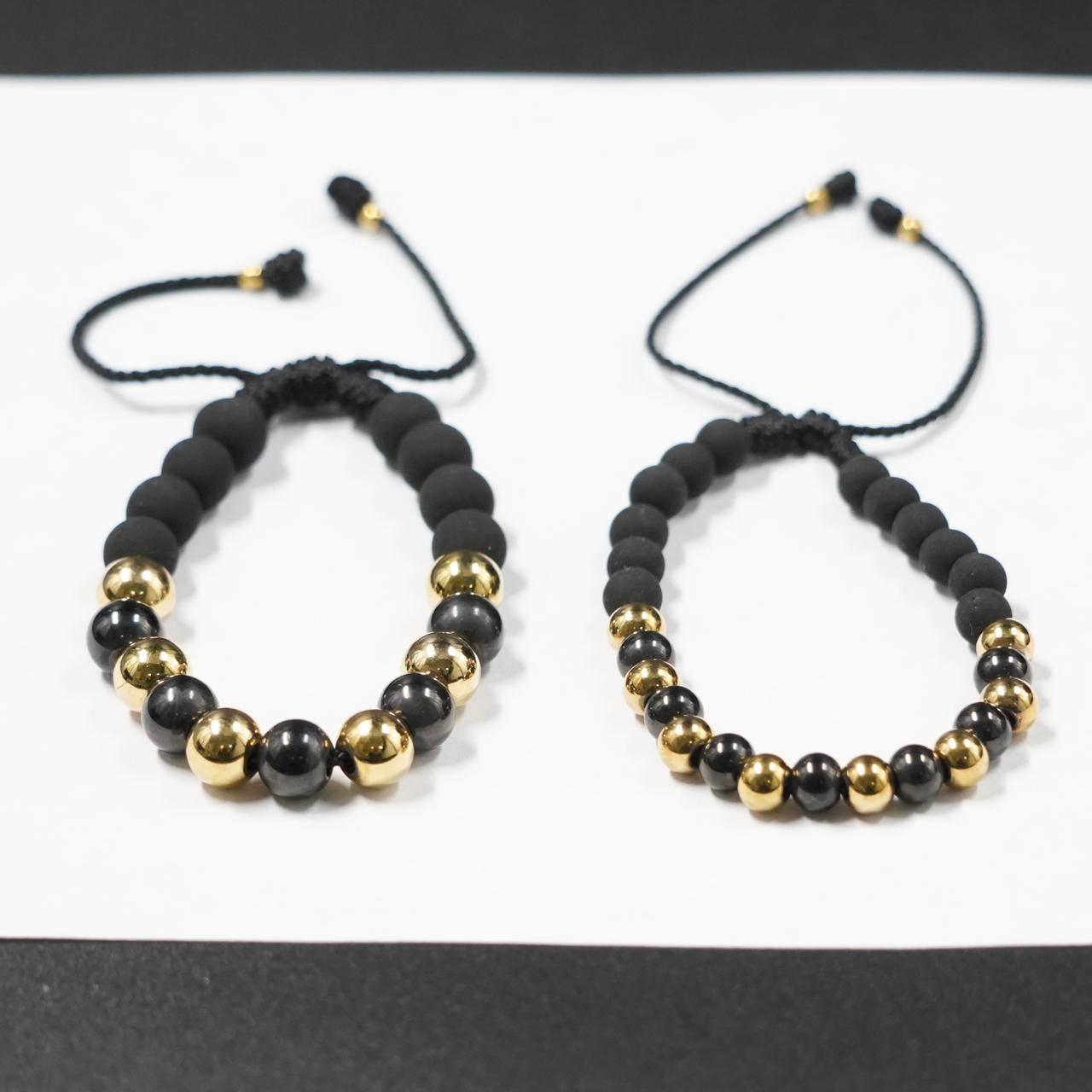 PULSERA 2X1 DORADO-NEGRO PAVONADO (GR-DE